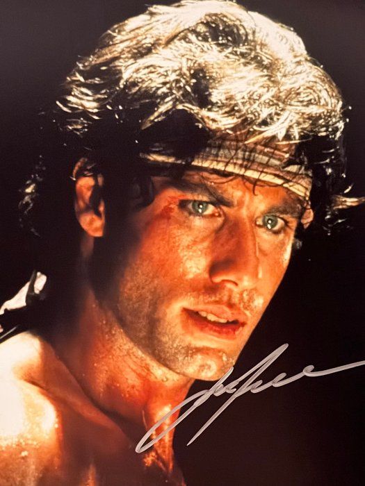 Lot 27: Stayin Alive John Travolta signed photo