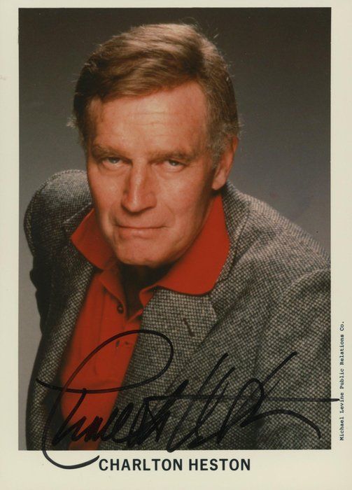 Lot 185: Planet of The Apes Charlton Heston signed photo. GFA Authenticated