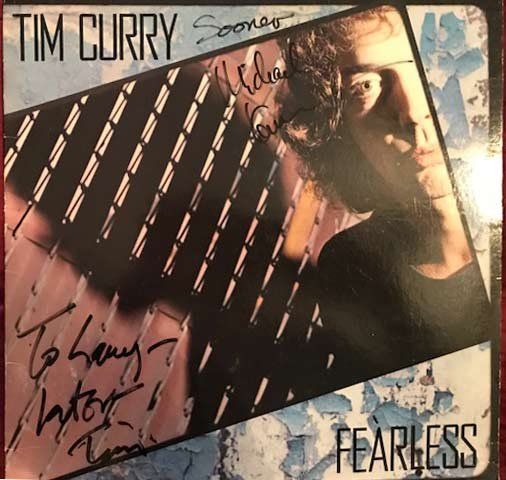 Lot 217: Tim Curry Fearless signed album