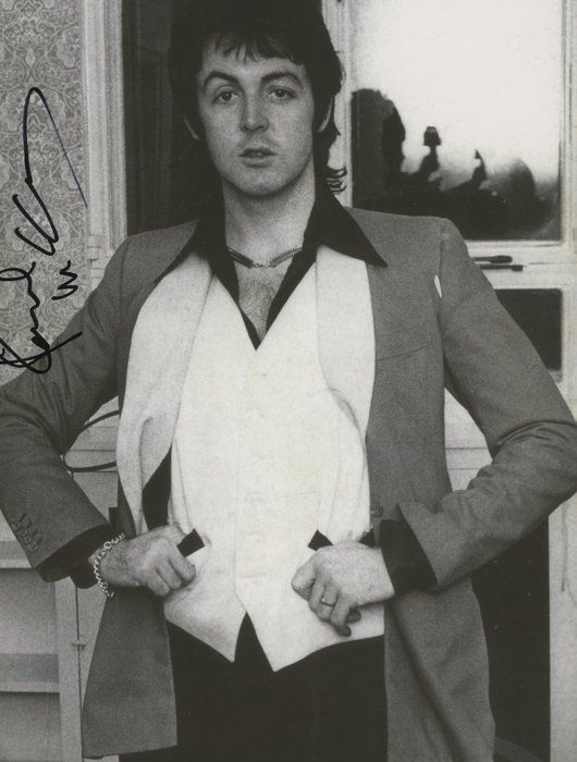 Lot 320: Paul McCartney signed photo. GFA Authenticated