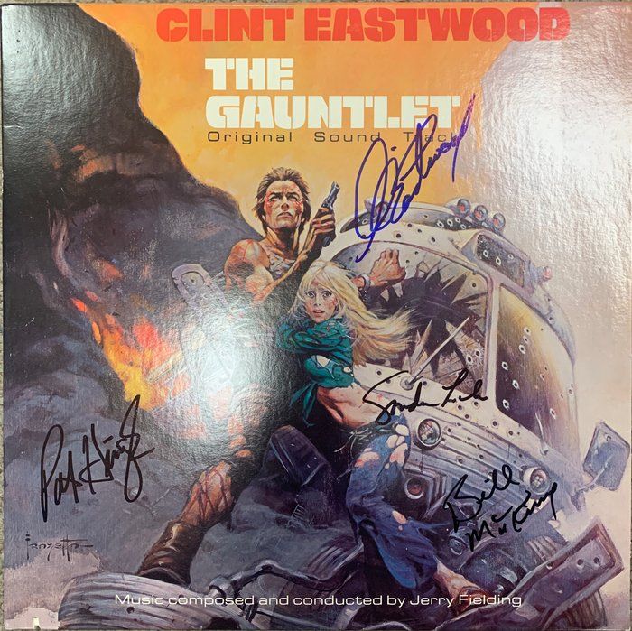 Lot 356: The Gauntlet cast signed sound track. GFA Authenticated