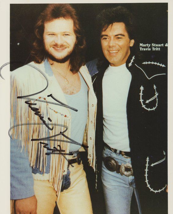 Lot 217: Country Legend Travis Tritt signed photo