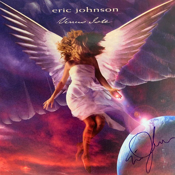 Lot 300: Eric Johnson Venus Isle signed album flat. GFA Authenticated