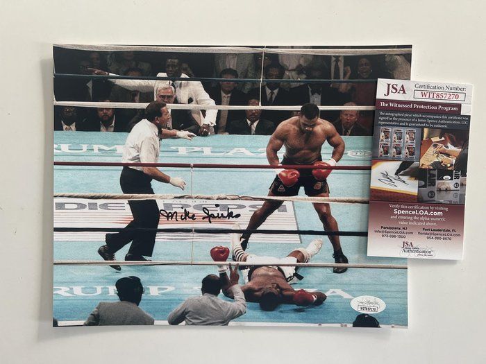 Lot 582: Michael Spinks signed photo. JSA
