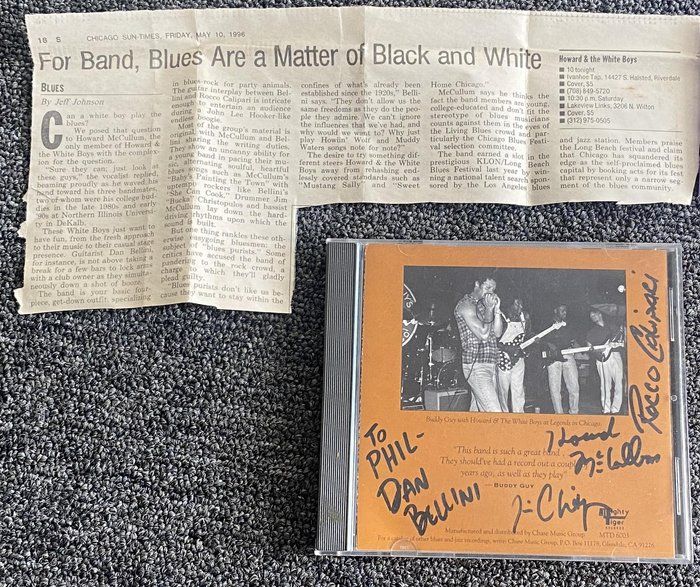 Lot 646: Howard & The White Boys signed CD with newspaper clipping