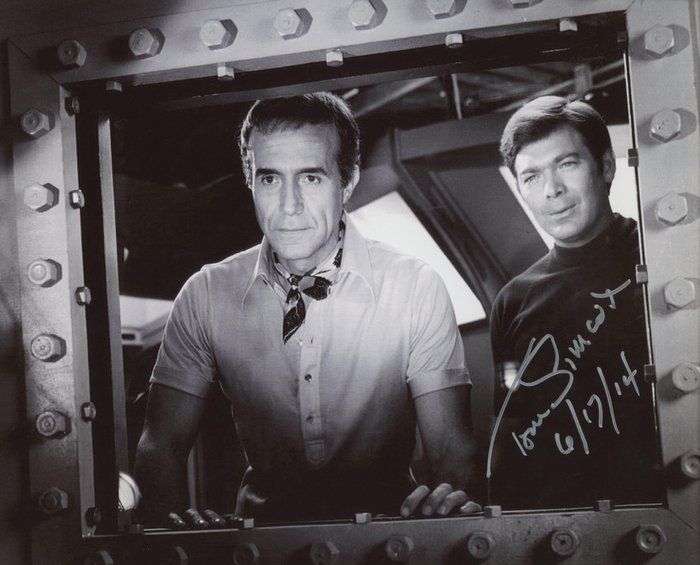 Lot 683: The Aquarians Tom Simcox signed photo. GFA Authenticated