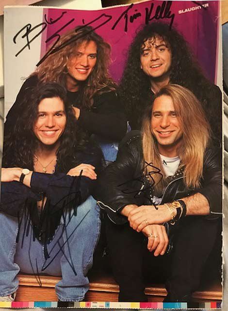 Lot 535: Slaughter signed magazine inside cover photo