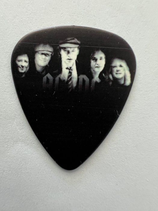 Lot 65: AC/DC guitar pick