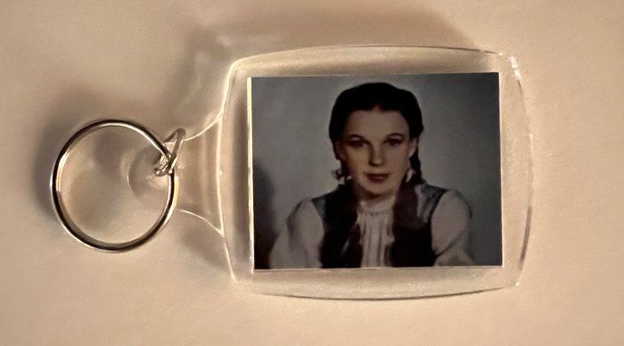 Lot 93: Wizard of Oz keychain. 2x3 inches