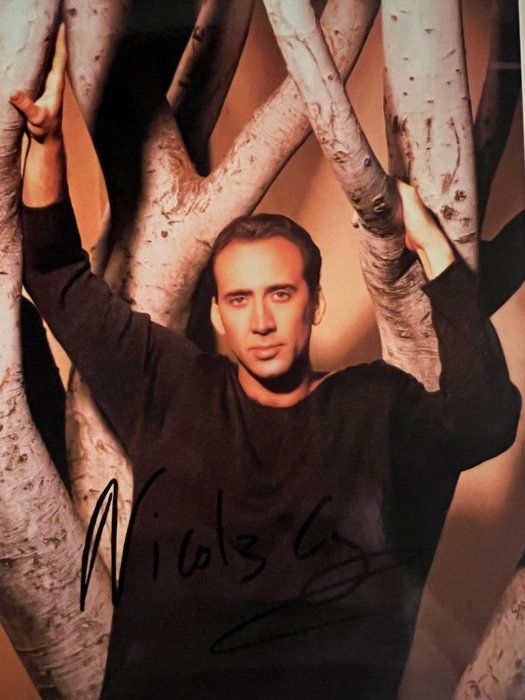 Lot 140: Nicholas Cage facsimile signed photo. 5x7 inches