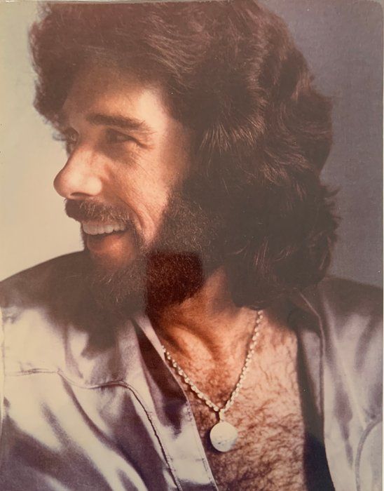 Lot 202: Eddie Rabbitt 11x14 photo unsigned