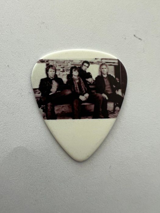Lot 221: Bon Jovi guitar pick