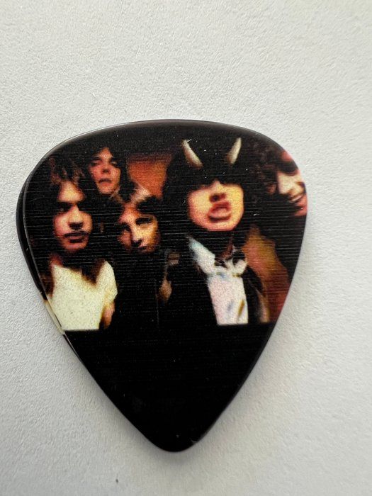 Lot 233: AC/DC guitar pick