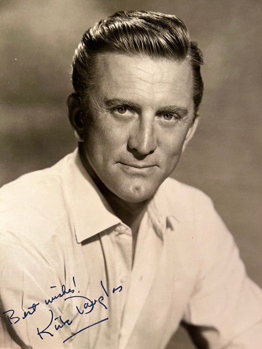 Lot 436: Kirk Douglas facsimile signed photo. 8x10 inches