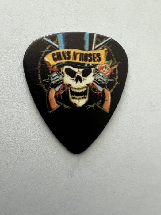 Lot 634: Guns N' Roses guitar pick