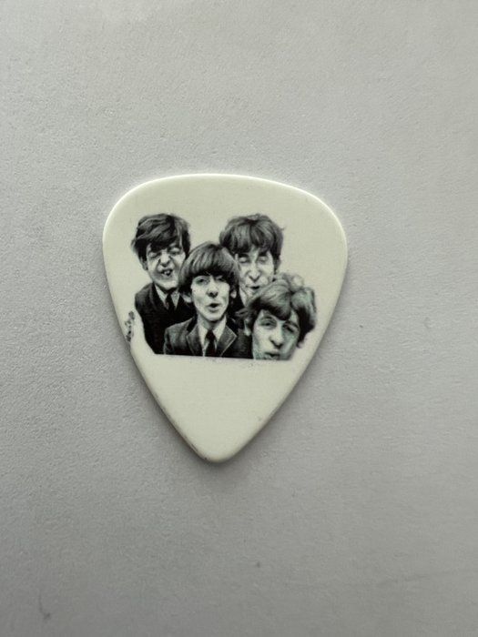 Lot 666: The Beatles guitar pick