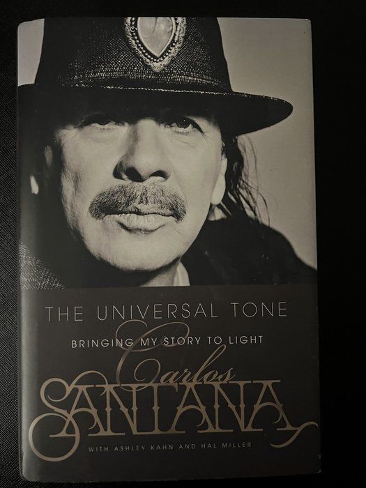 Lot 686: The Universal Tone Carlos Santana Memoir Hardcover w/ Dust Jacket