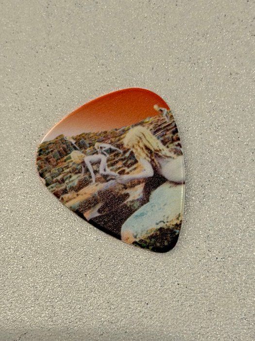 Lot 732: Led Zeppelin Houses of the Holy Guitar Pick