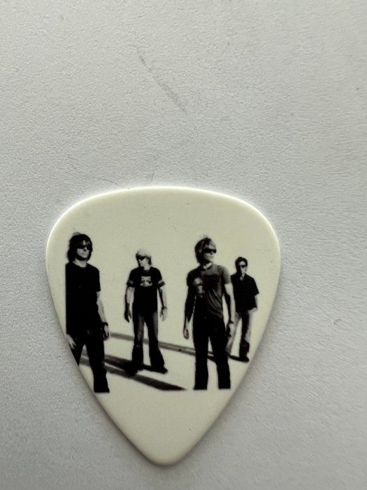 Lot 775: Bon Jovi guitar pick