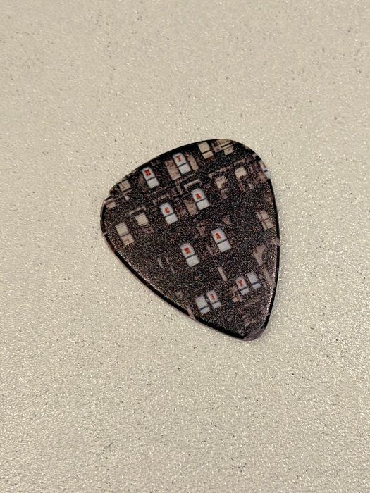 Lot 797: Led Zeppelin Physical Graffiti Guitar Pick