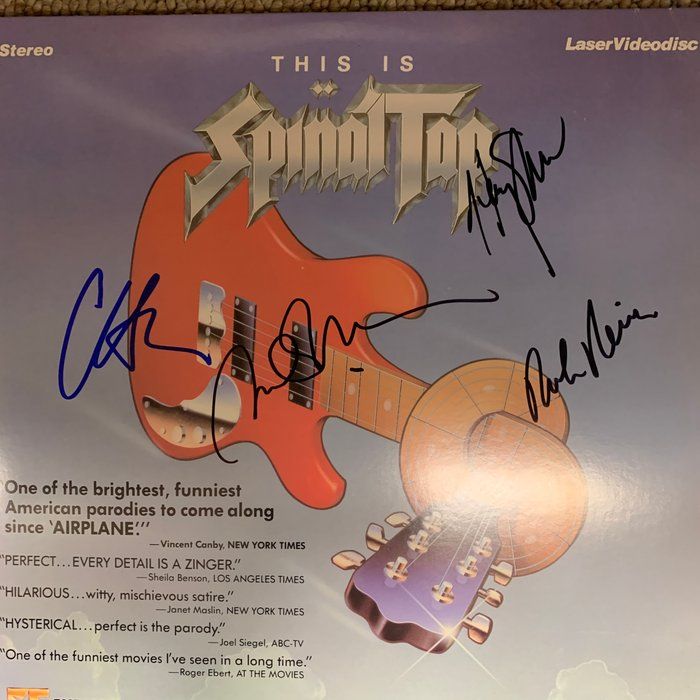 Lot 133: This Is Spinal Tap cast signed laser disc. GFA Authenticated