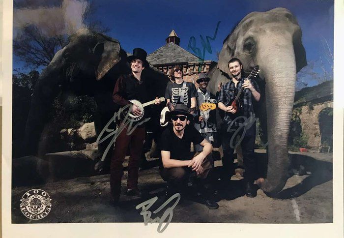 Lot 159: 100 Monkeys band signed photo