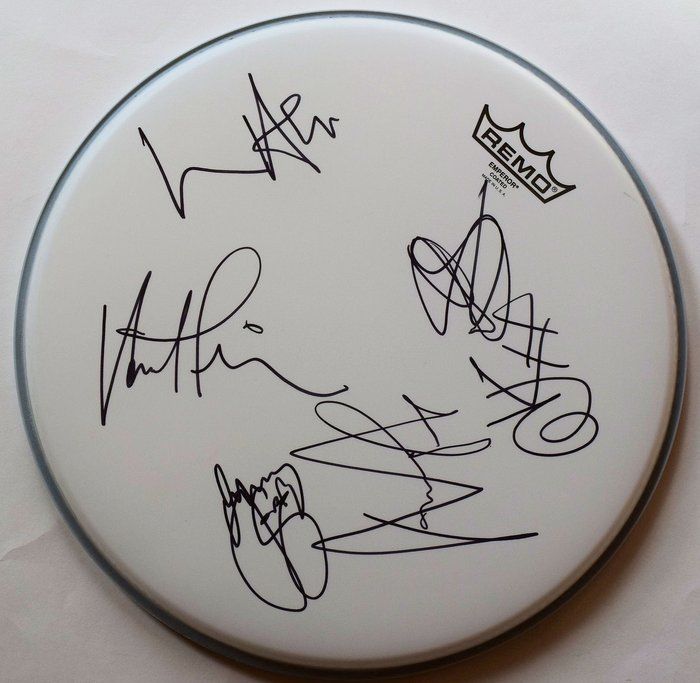 Lot 303: INXS signed drum head