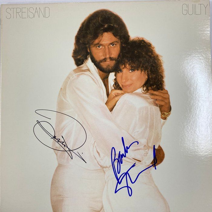 Lot 354: Barbra Streisand Guilty signed album. GFA Authenticated