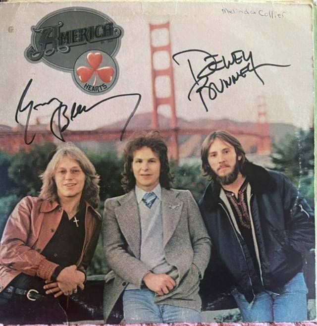 Lot 89: America 1975 Hearts band signed album