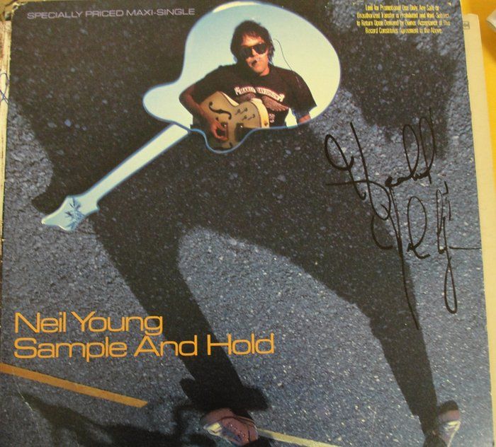 Lot 208: Neil Young Sample and Hold signed album