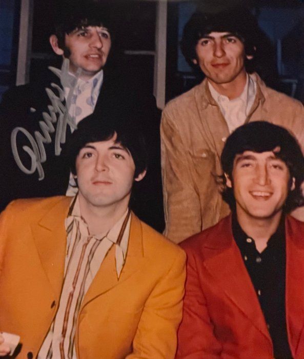 Lot 353: The Beatles Ringo Starr signed vintage band photo