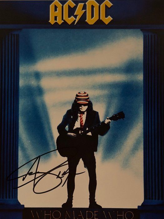 Lot 364: AC/DC Angus Young signed photo