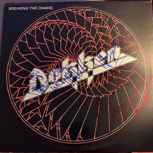 Lot 421: Dokken signed Breaking the Chains