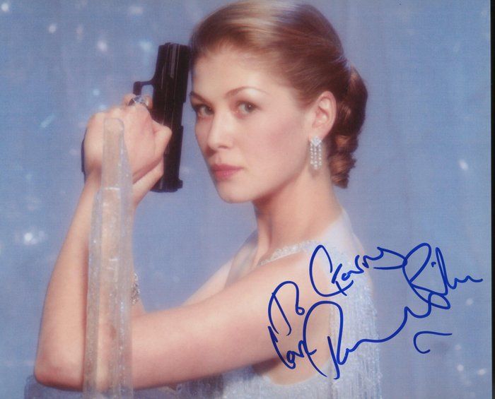 Lot 568: Jack Reacher Rosamund Pike signed photo