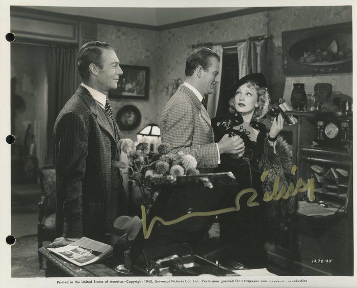 Lot 659: Marlene Dietrich signed movie photo. GFA Authenticated