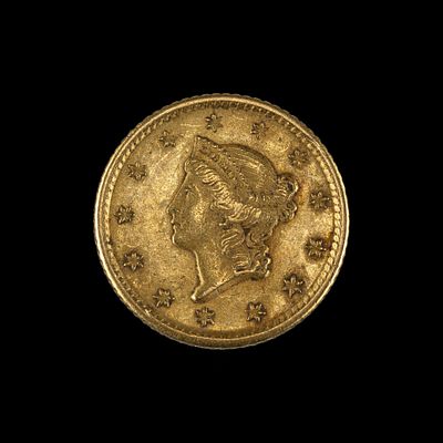 1849-O Gold Dollar Coin. DESCRIPTION: An early gold dollar from the New Orleans mint in 