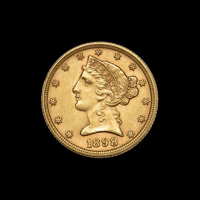 1898 Five Dollar Gold Coin. DESCRIPTION: A nice XF coin showing mint luster and original toning 