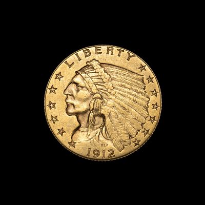 1912 $2.50 Indian Head Gold Coin. DESCRIPTION: A VF to XF coin with good surfaces. MEASUREMENT: 