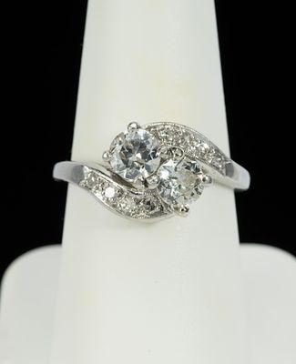 Platinum 1.16 CTW Diamond Toi Et Moi Ring. DESCRIPTION: Platinum ring with two central round 