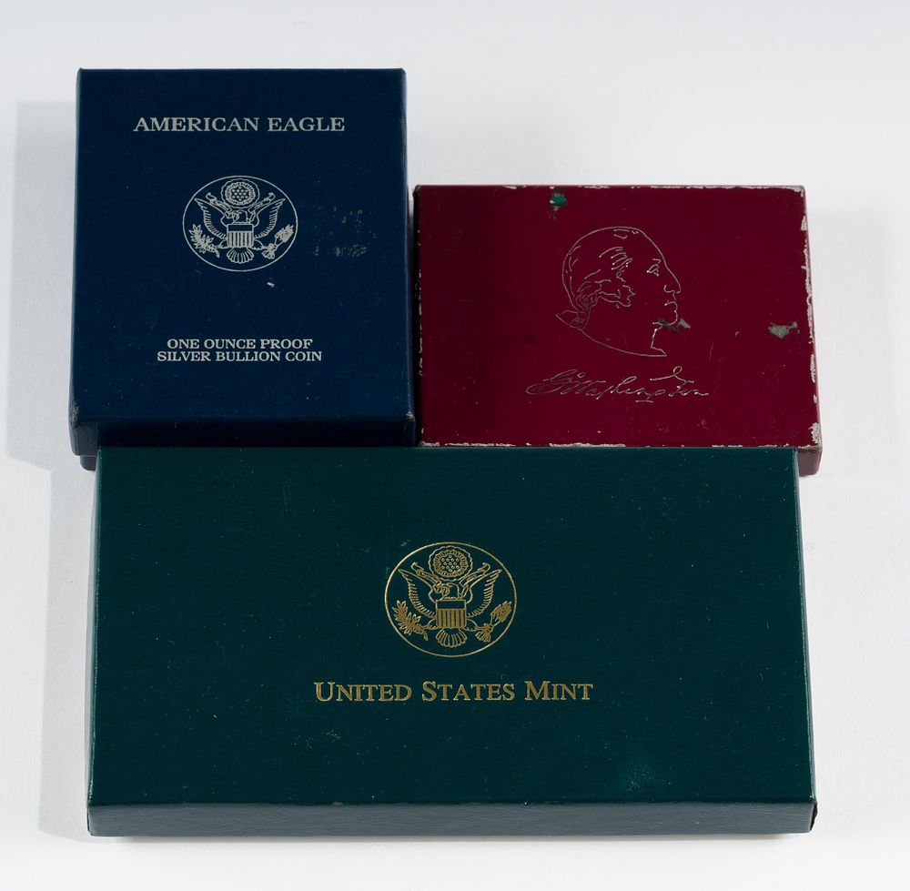 1983 Olympic Silver Dollar, 1982 Half Dollar, 2002 American Eagle. Proof 1983 Olympics silver 