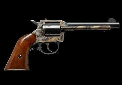 H & R Model 676 Double Action Revolver, Caliber .22/.22WMR. Serial Number: AS9072 Design: This