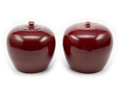 Pair of Chinese Sang de Boeuf Jars. Qing Dynasty ox blood glazed lidded jars. The interior glaze