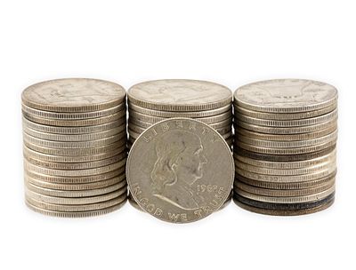 Fifty Silver Half Dollars. The lot includes Franklin, Walking Liberty, and Kennedy. All are 90%