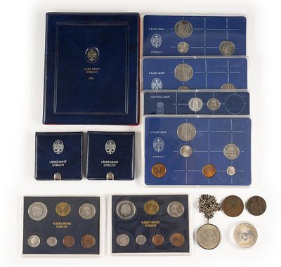 Four Netherlands Silver Coins And Netherlands Mint Sets. 1970 10 Gulden in .720 silver on a
