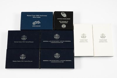United States Mint Commemorative Silver Dollars. Seven military and law enforcement