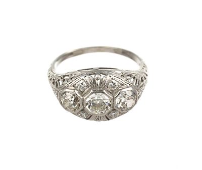 Antique Platinum and Diamond Ring. A size 6.5 antique platinum filigree ring with a 0.52 carat 