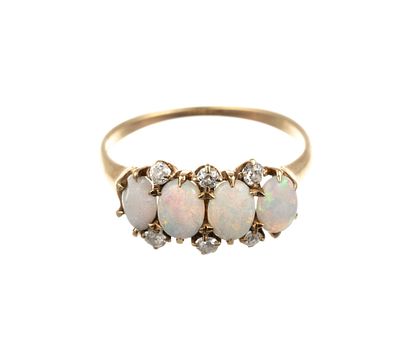 14K Gold Ring With Opal and Diamonds. A yellow gold antique size 6 ring with opals and small 