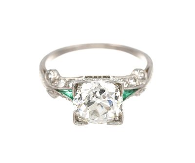 Antique Platinum 1.98 Ct Diamond and Emerald Ring. Antique platinum setting with center 