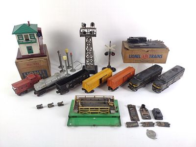 Grouping of Toy Trains and Accessories incl Lionel Trains. Trains include 2 Lionel Lines Erie 