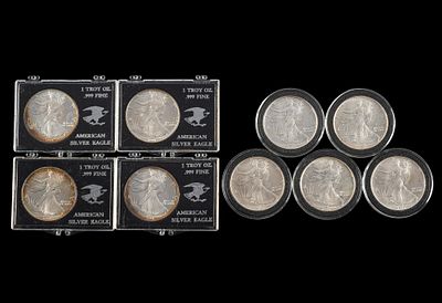 Nine American Eagle Silver Dollar Bullion Coins. Each one ounce pure silver, uncirculated, in 